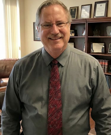 M&A Advisor Stan Cortland, expert in contractor business exits for the Western U.S., professional headshot.