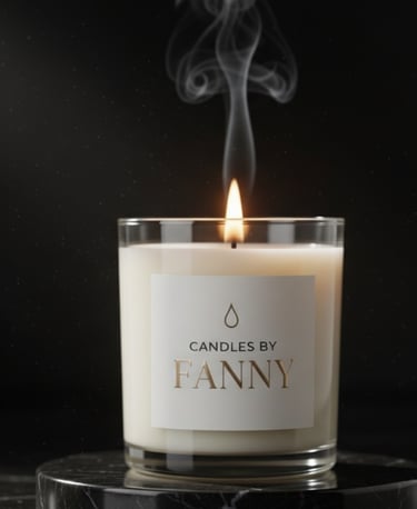 Scented soy candle in a glass jar with a flickering flame and wisps of smoke on a dark background.