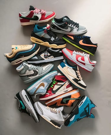 a bunch of different colored sneakers are shown