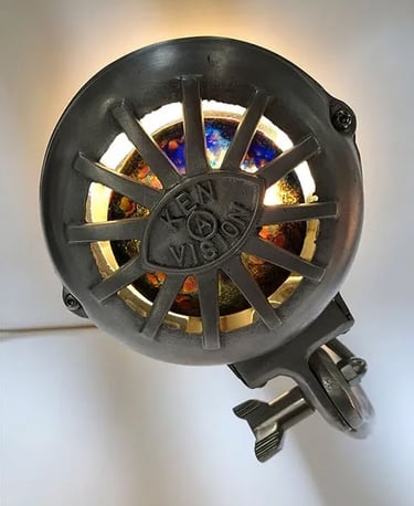 Top view of art lamp made from microscope projector with blown glass.