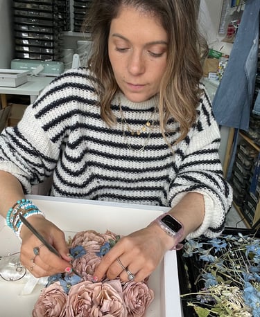 Jenny from Infinity Flowers expertly preserving a wedding bouquet