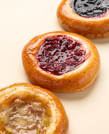 buns with a shiny berry surface