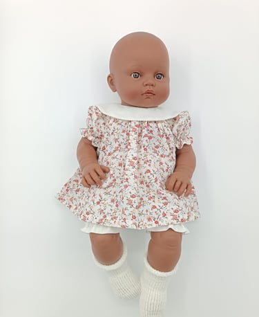 Minikane Les Bambinis doll in handmade dress and bloomers