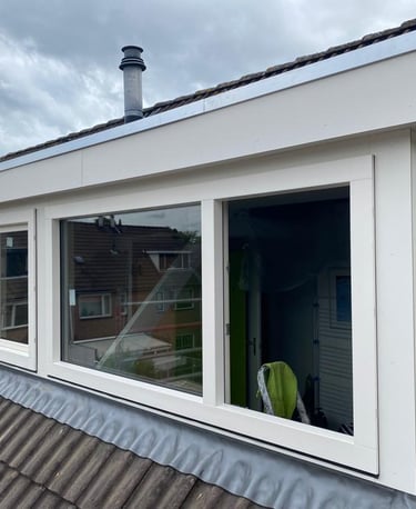 a window with a view of a roof top