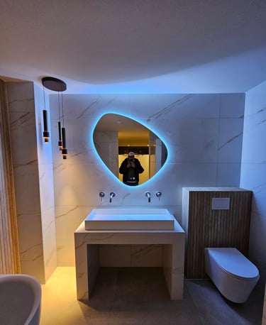 a bathroom with a mirror and a sink