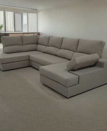 a couch with a large sectional couch in a living room