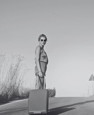 a woman on holiday with a suitcase