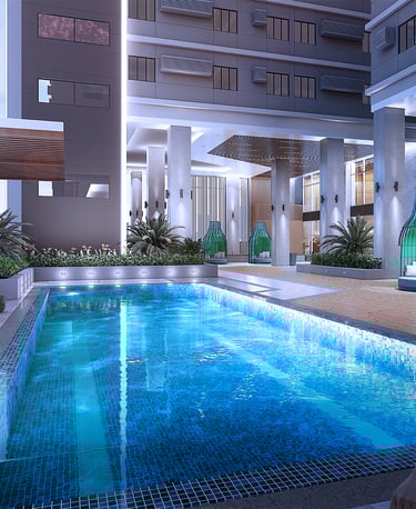 a woman in a green dress standing in front of a swimming pool