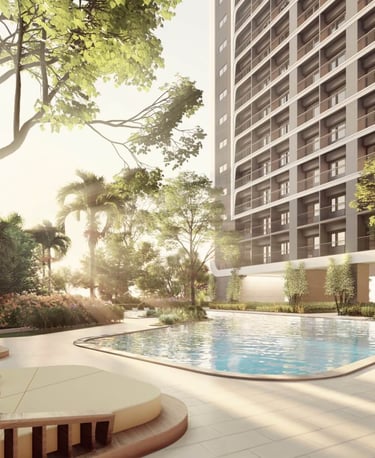 a large swimming pool with lounge chairs and a lounge area