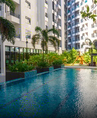 a pool with a view of a building