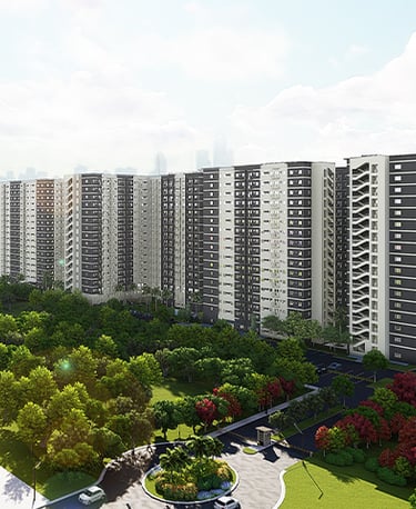 a large apartment complex with a parking lot and a lot of trees