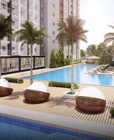 a pool with lounge chairs and a swimming pool