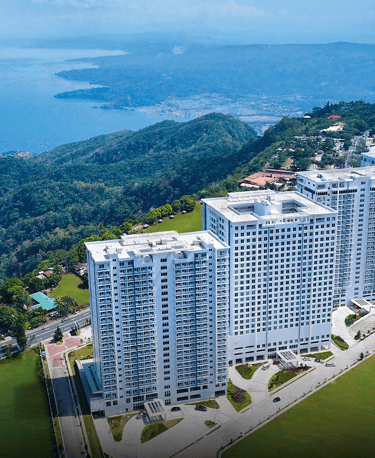a large apartment complex with a soccer field and a soccer field