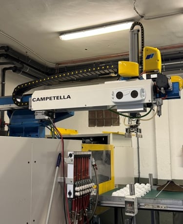 Robot y maquina de inyección