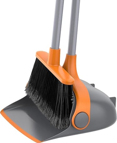 Orange and grey broom and dustpan set with long handles for upright floor cleaning.