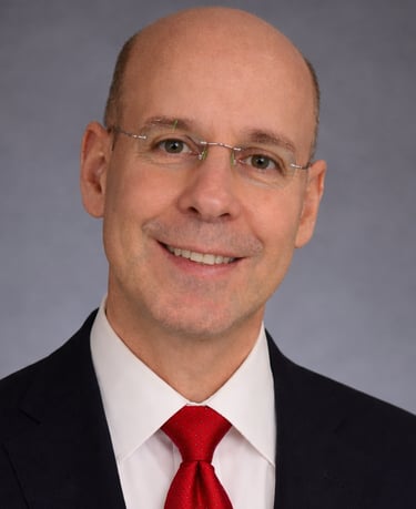 Professional headshot of John Bancroft, Founder / Partner