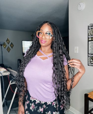 a woman with long goddess braids