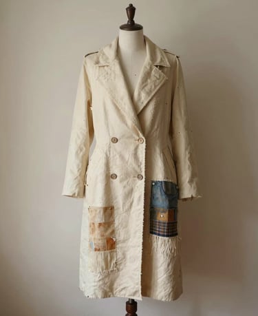 Elegant designer handbags displayed on a vintage wooden table