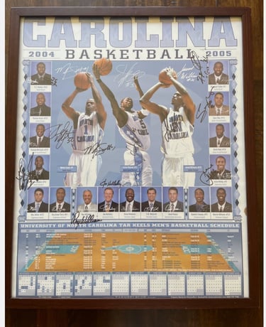 "University of North Carolina poster featuring school colors, logo, and athletic imagery."