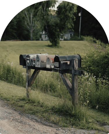 5 mailboxes along side each other 