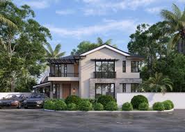 Maison de luxe moderne à deux étages au Cameroun, végétation tropicale, deux voitures garées.