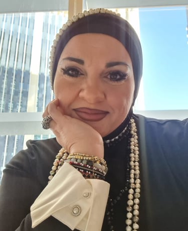 a woman in a black jacket and pearls