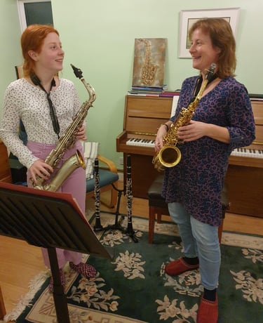 Verity Morris teaching the saxophone
