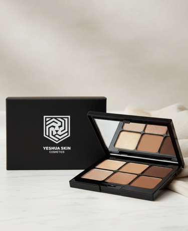 Yeshua Skin Cosmetics eyeshadow palette with neutral earth tone shades and built-in mirror.