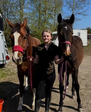 Rosie Shaw holding her horses