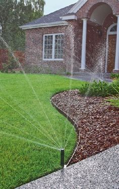 taş duvar uygulaması ile desteklenmiş peyzaj tasarımı