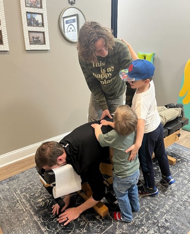 Adult receiving chiropractic care for anxiety, stress, or gut health in Franklin TN