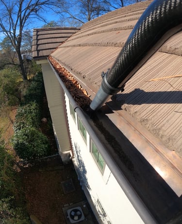 gutter cleaning with a gutter vac