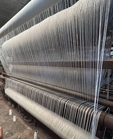 Handloom carpet in the making on a traditional loom