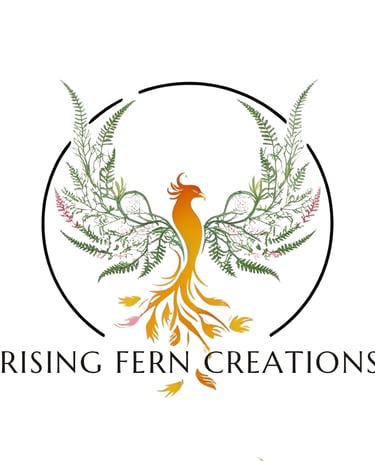 Rising Fern Creations logo with an orange phoenix and green fern-shaped wings, inside a black circle