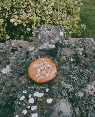 a rock with writing on it on a rock