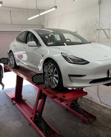 wheel alignment for electric cars, Tesla