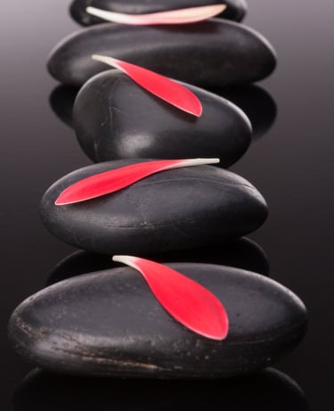 Relaxing Hot Stone full body massage at Studio 9, the best unisex spa in Ambattur Chennai