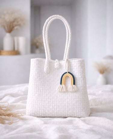Handwoven white plastic tote bag handmade from recycled materials by Indonesian artisans