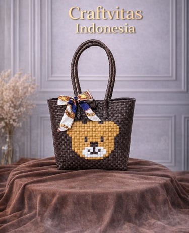 Brown handwoven plastic tote bag with bear character design, handmade sustainable tote bag