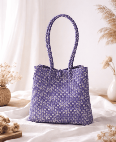 Handwoven purple striped plastic tote bag handmade from recycled materials by Indonesian artisans