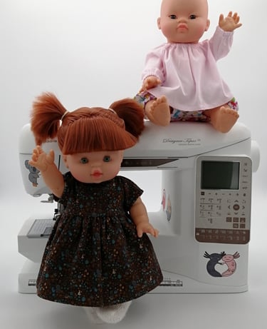 Minikane dolls in handmade clothing
