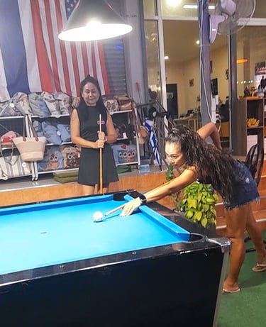Thai women playing pool at bar near Soi 94 in Hua Hin
