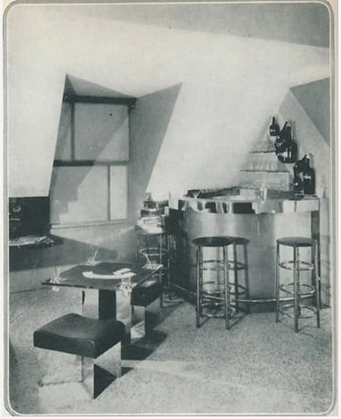 Historic modern interior with low furniture and simple shelves, showing Charlotte Perriand’s practic