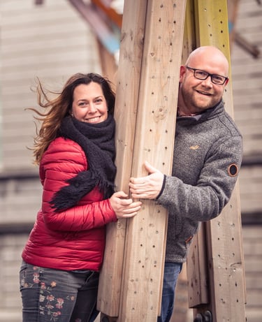 a man and woman standing next to each other