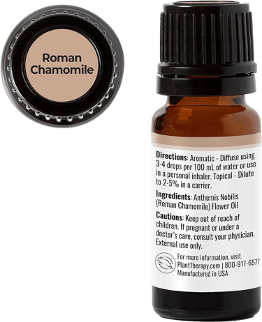 Roman Chamomile oil bottle with usage directions, cautions, and labeled cap.