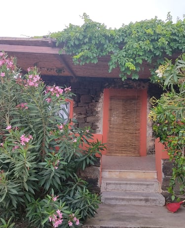 Dammuso in Khattibuale with stone entrance near Lake Specchio di Venere