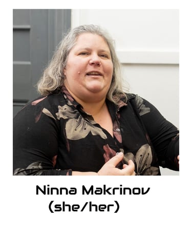 Ninna is a white mid fat middle aged woman. She has natural white hair. 