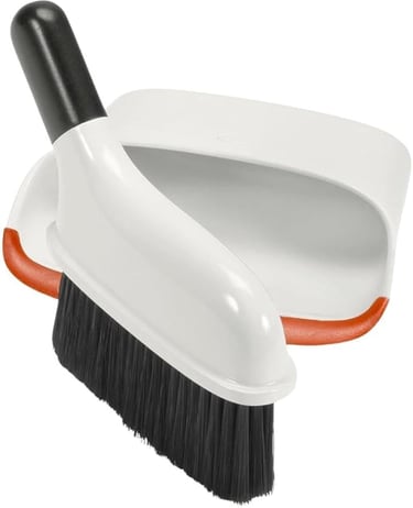 a broom and a brush on a white background