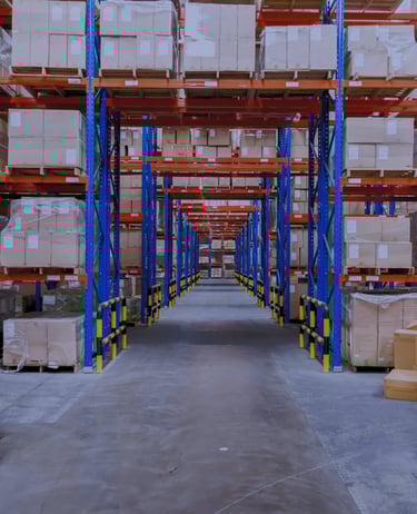 warehouse pallet racking with bridge bays storing boxes