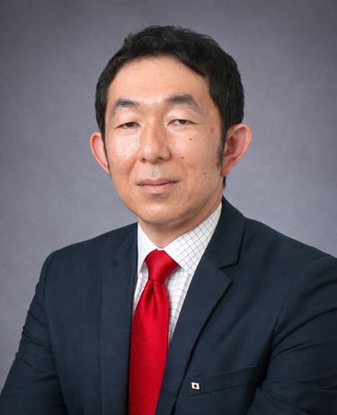 Professional headshot of Takuya Azaka